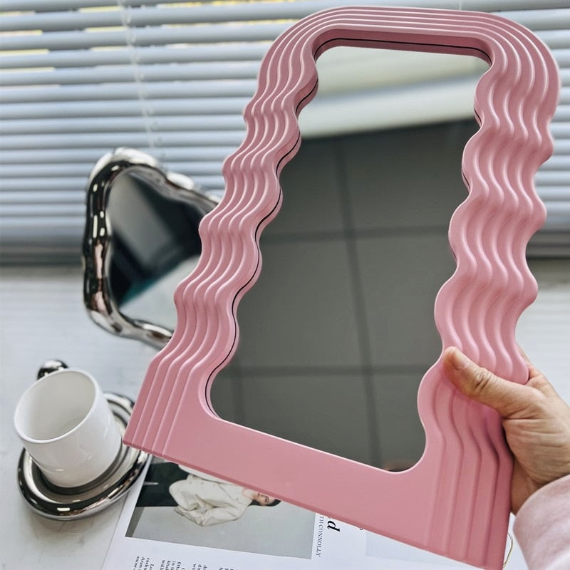Framed wave desktop mirror