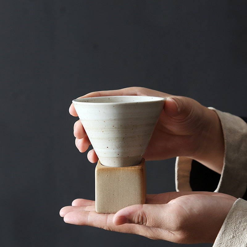 Retro-pointed Japanese pottery mug